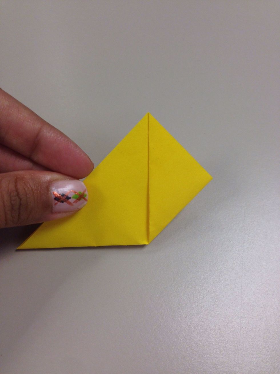 Fold it as shown from both sides