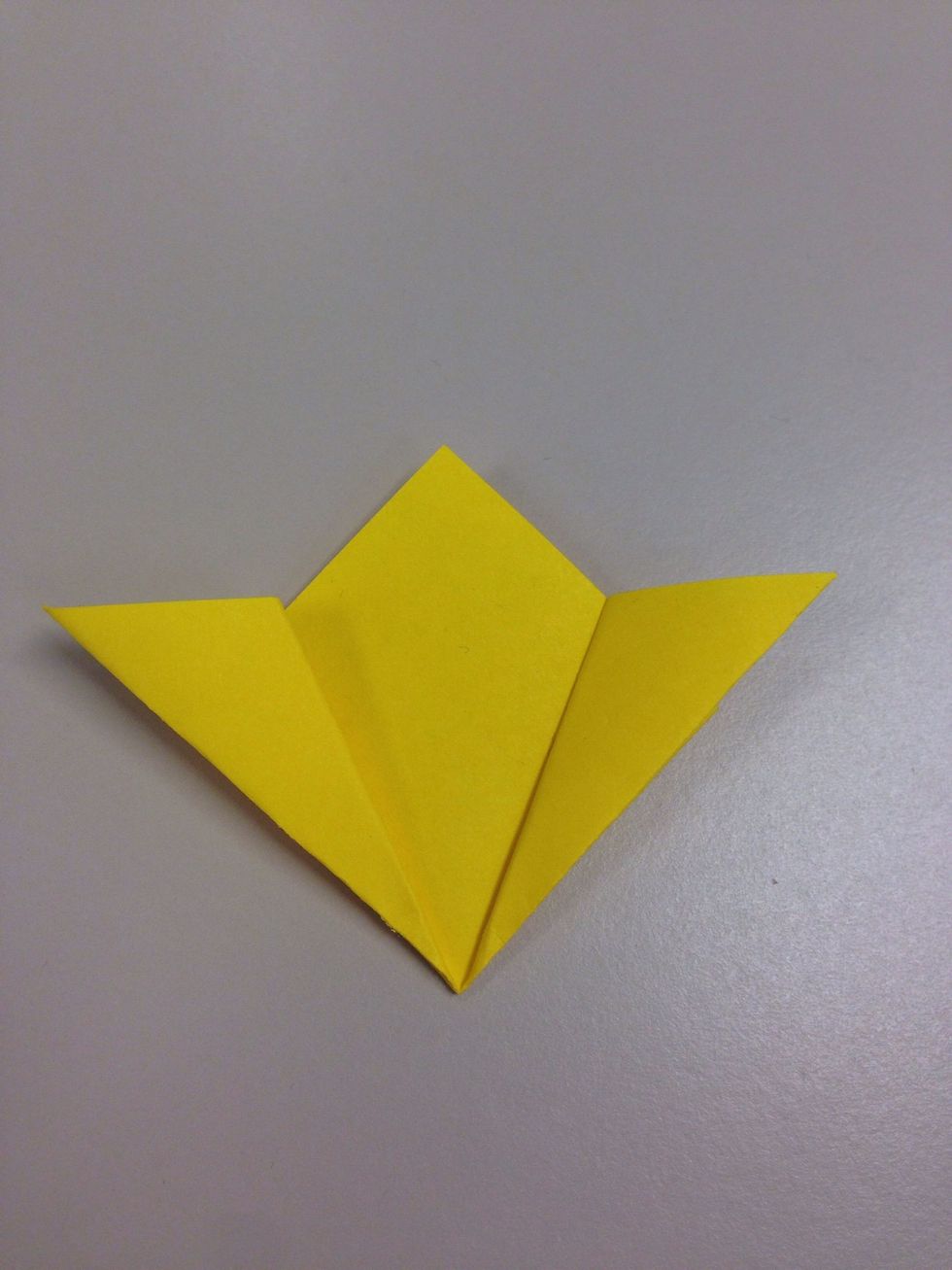 Fold it as shown from both sides