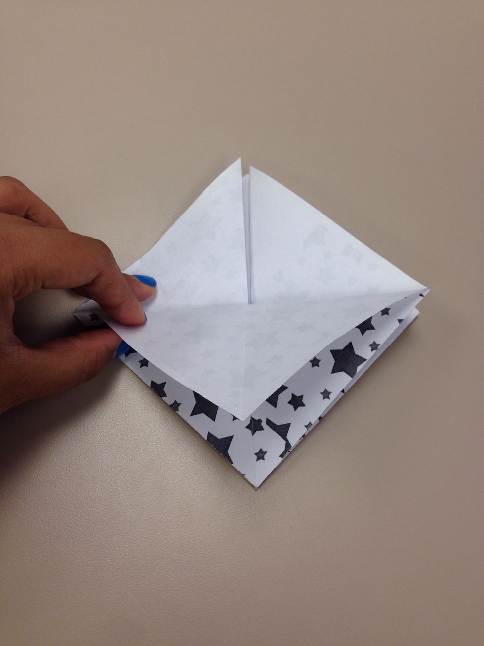 Fold it as shown on both sides