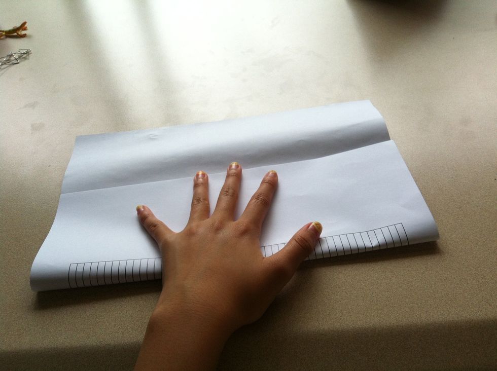 Fold it at the place you want to rip it