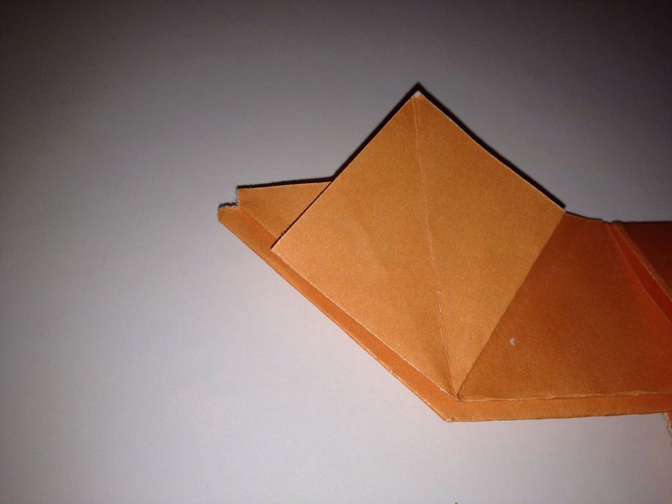 Fold it back on its self to get a flat ear .
