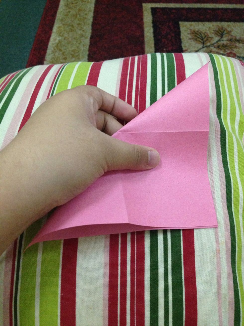 Fold it diagonally and unfold.