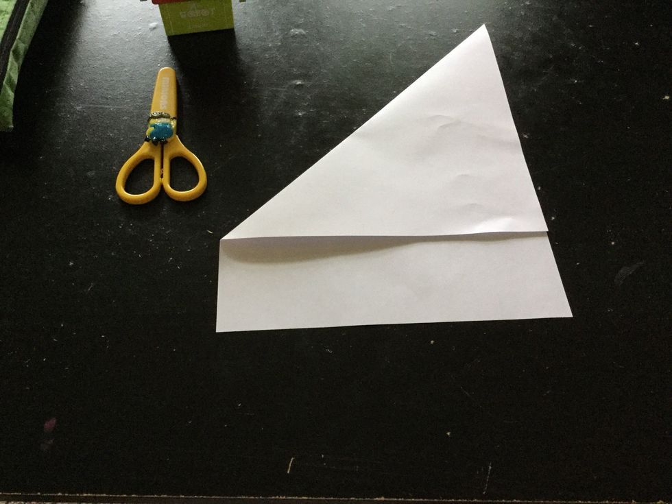 Fold it in a triangle if you don't understand go to the next slide