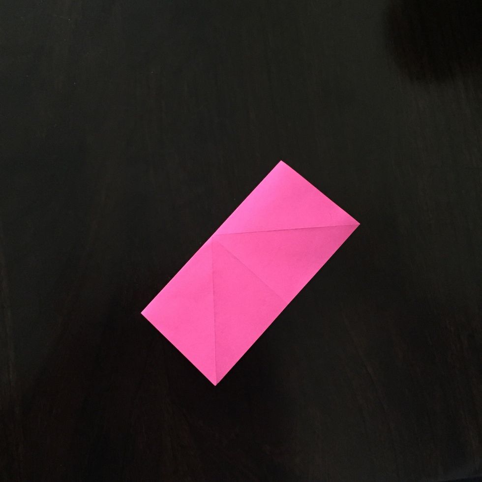 Fold it in half along the crease.