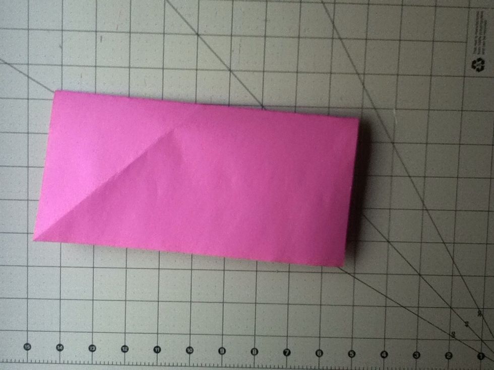 Fold it in half downwards