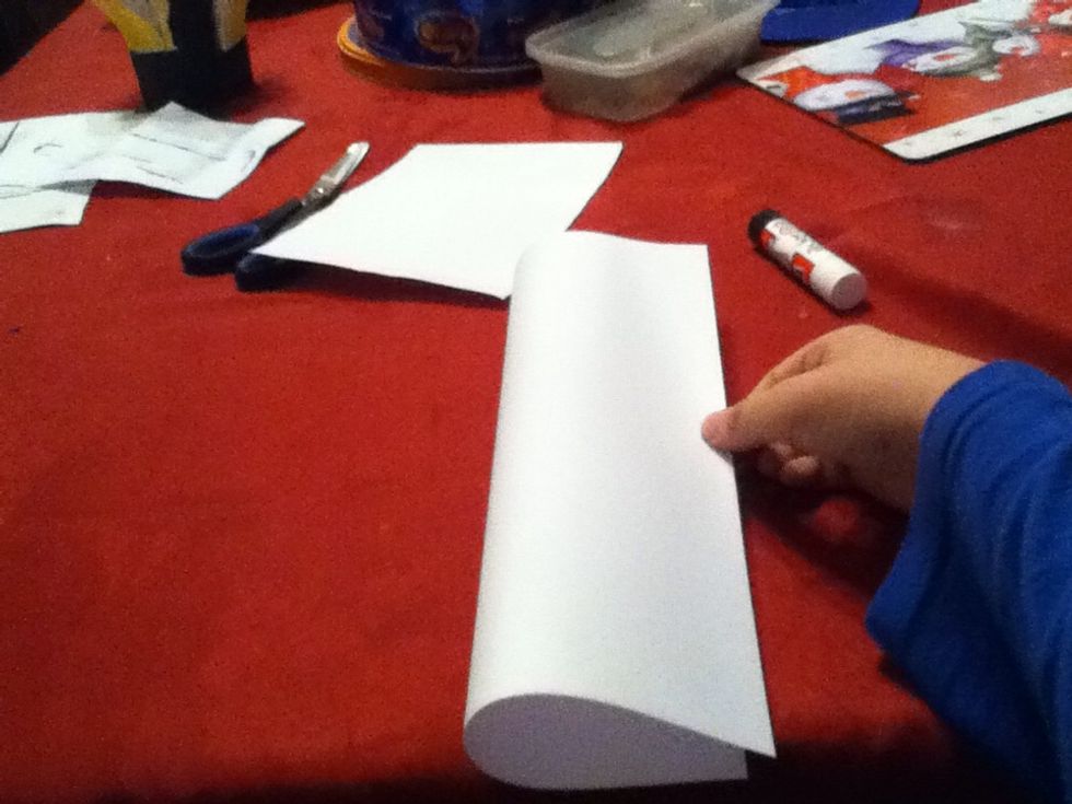 Fold it in half length ways