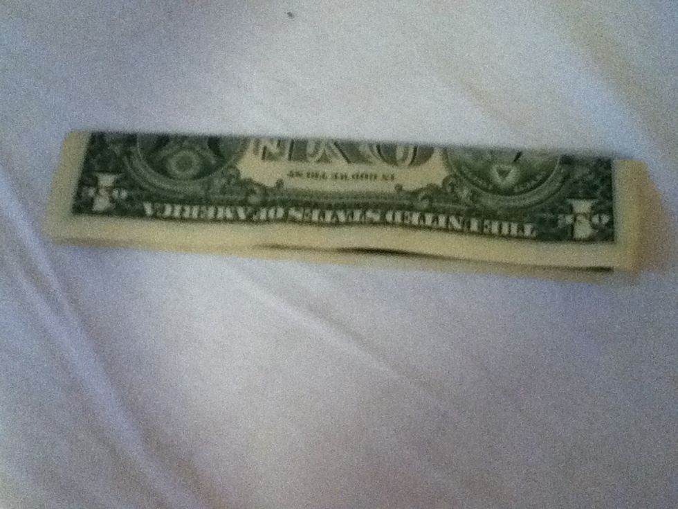 Fold it in half length wise