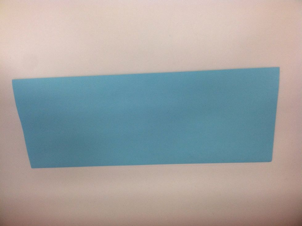 Fold it in half length-wise.