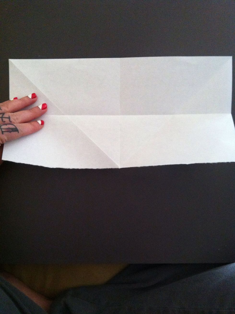 Fold it in half longways.