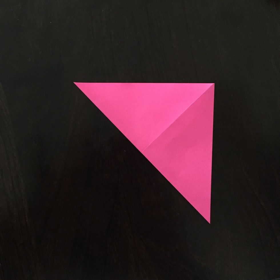 Fold it in half on the other diagonal.