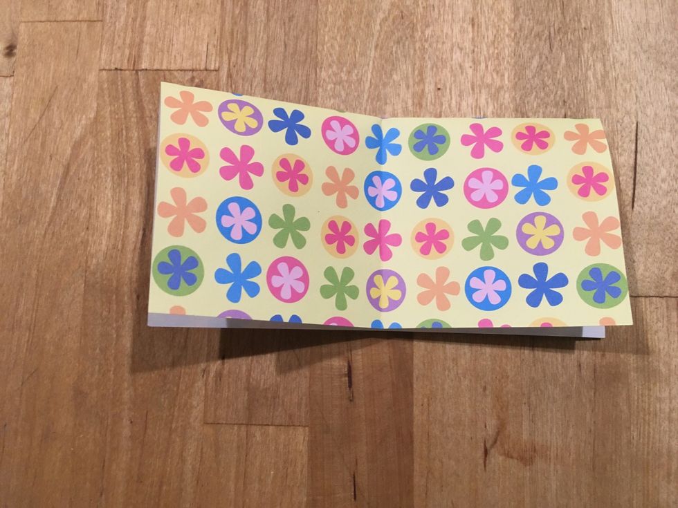 Fold it in half the other way and keep it like that