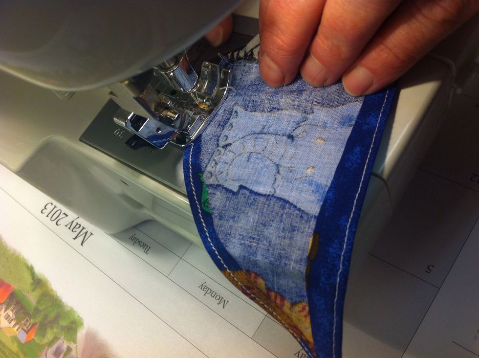 Fold it over a second time and sew down the current line.