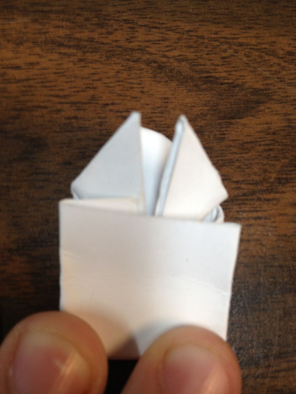 Fold it so it looks like he has a blanket