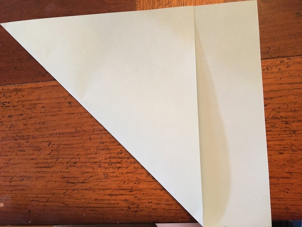 Fold it so the top makes a triangle