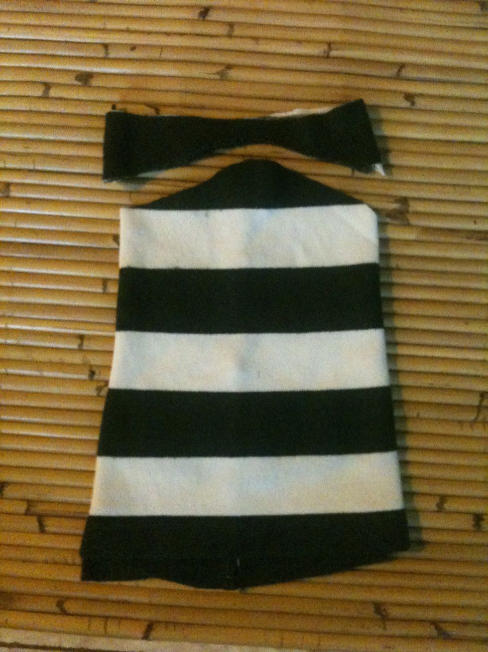 Fold it to 3 parts and cut the upper part to half a circle shape,