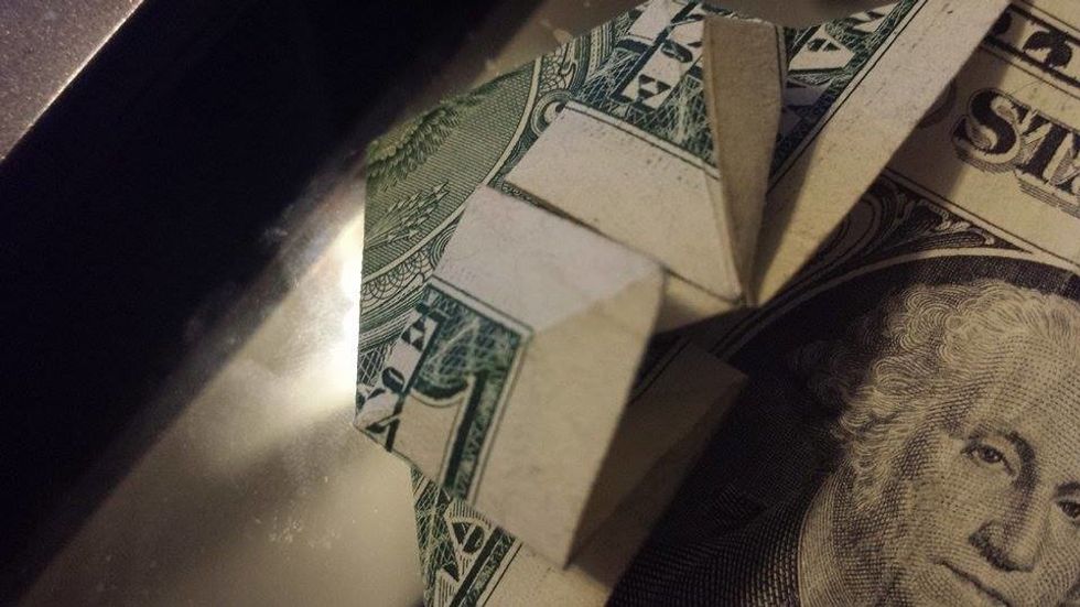 Fold it to the line (the line is shown in the picture)