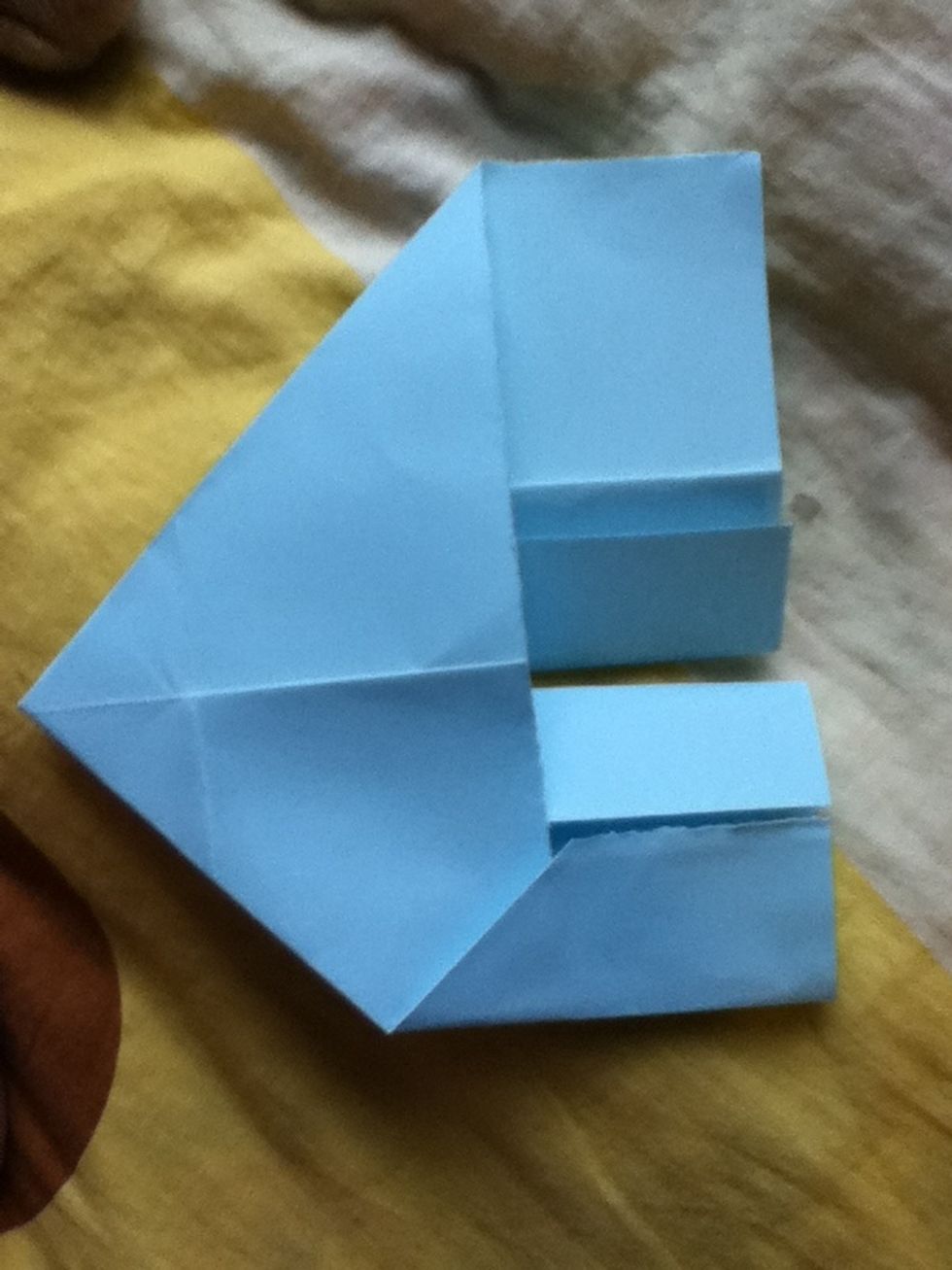 Fold it to toward the other piece...