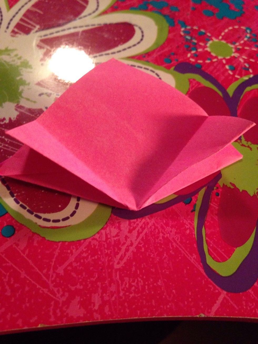 Fold kite flap together on each side