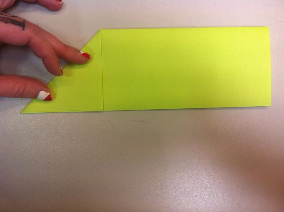 Fold left corner down.
