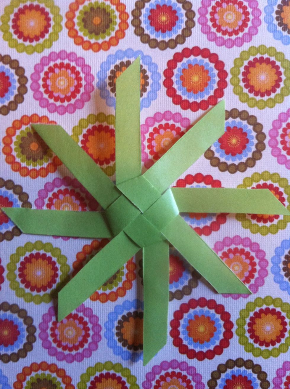 Fold left over & under diagonally.