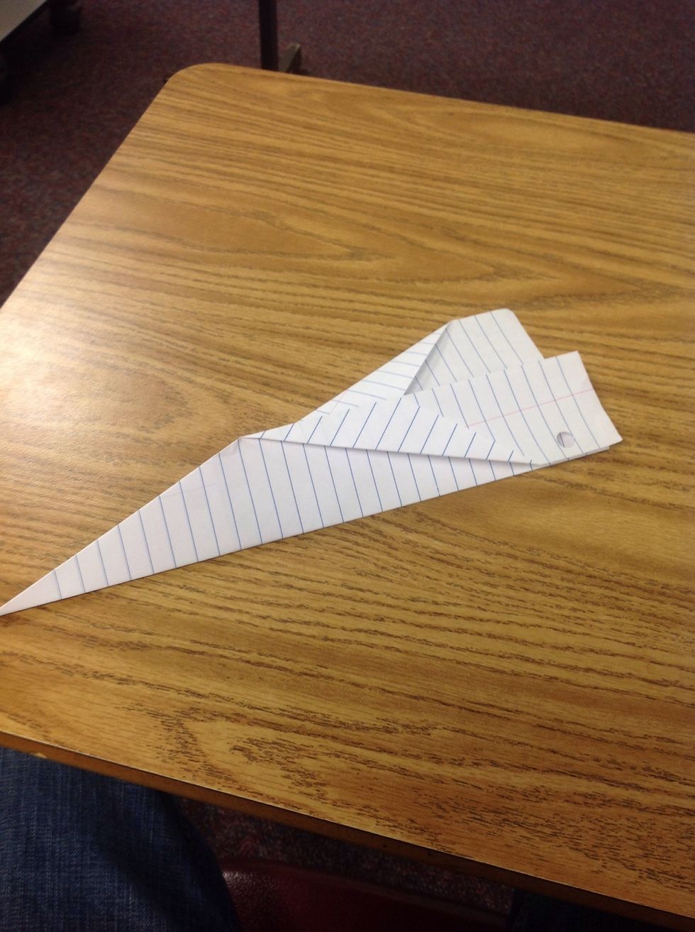 Fold left wing down towards the bottom