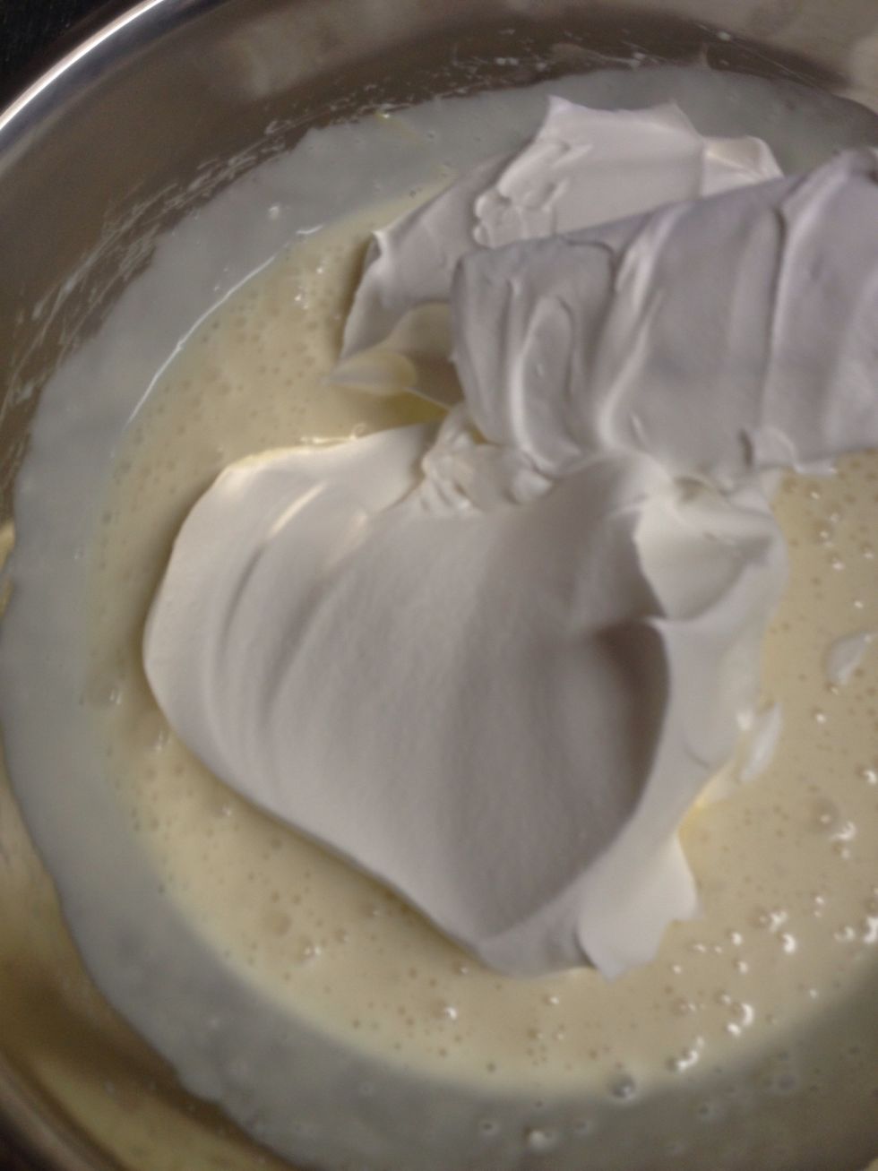 Fold, not stir, whipped cream into the cream cheese mixture.