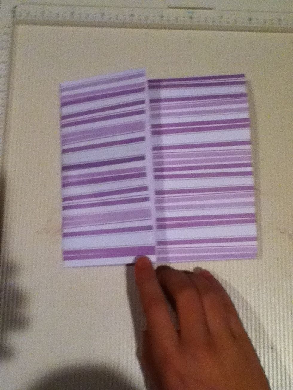 Fold on the scored line that you just made.