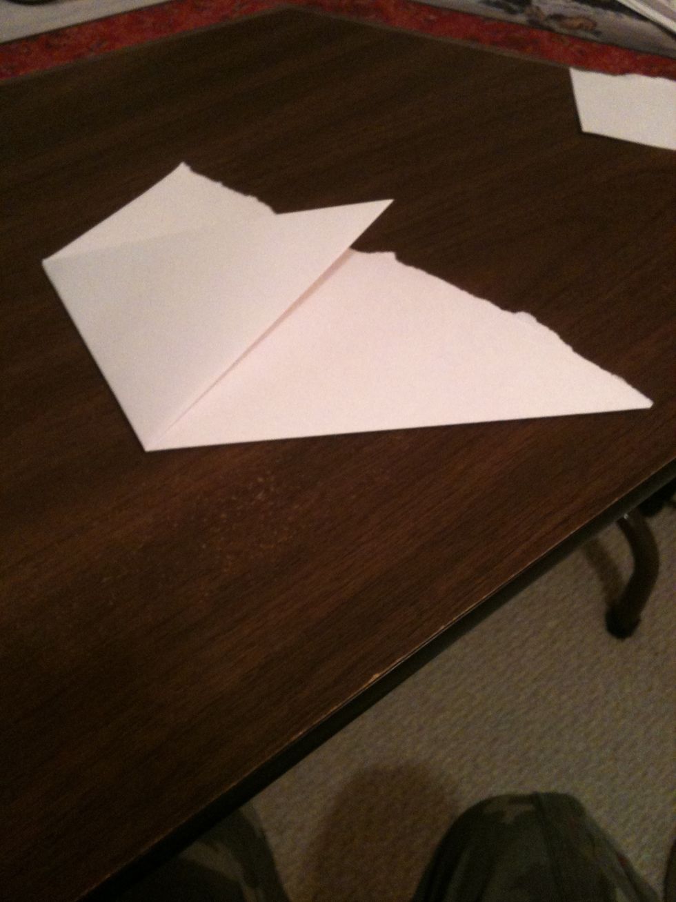 Fold one angle to the other side.