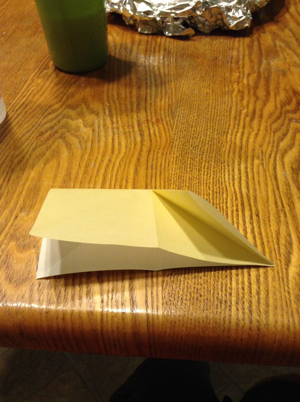 Fold one corner to the middle
