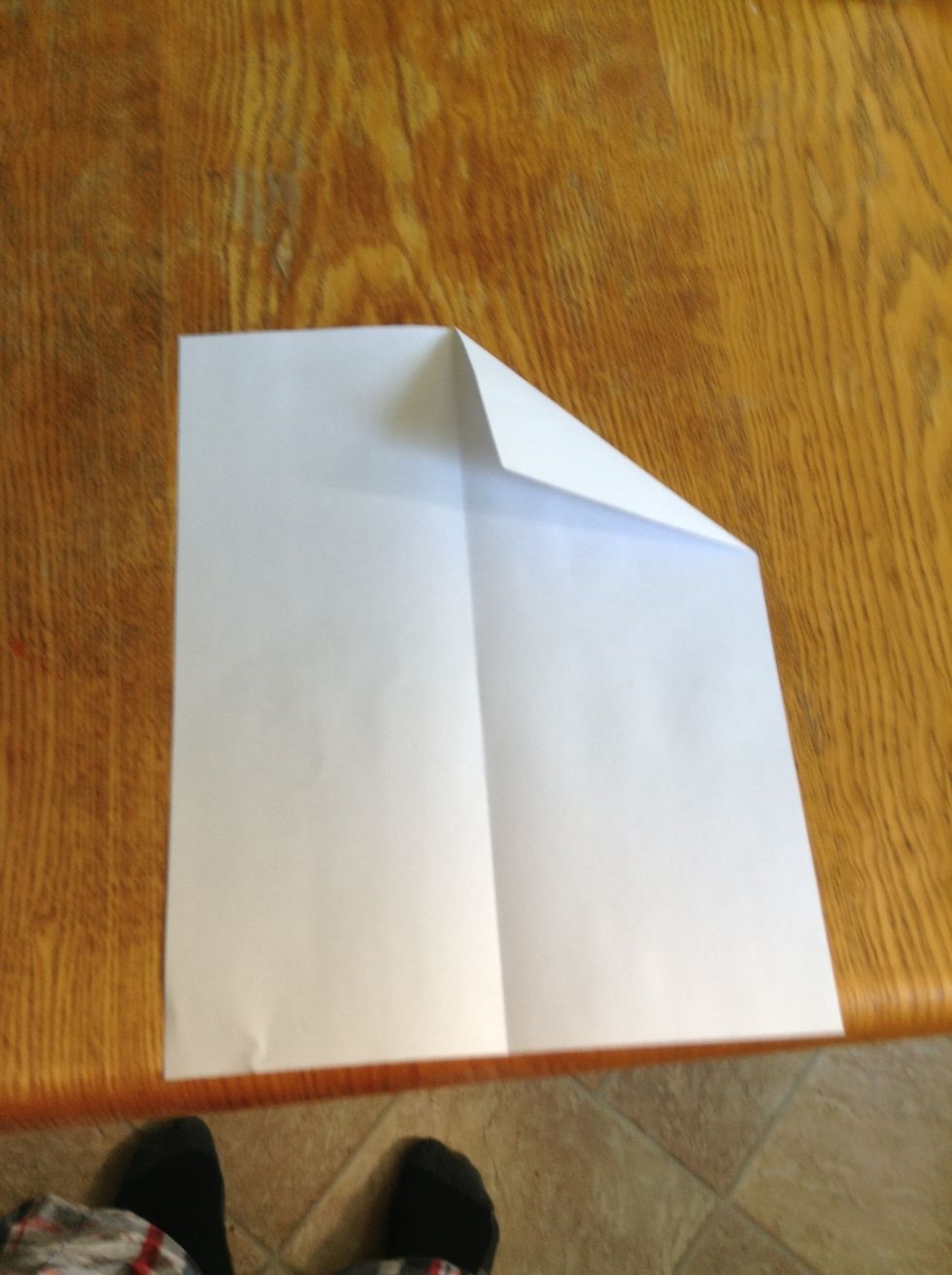Fold one corner to the middle