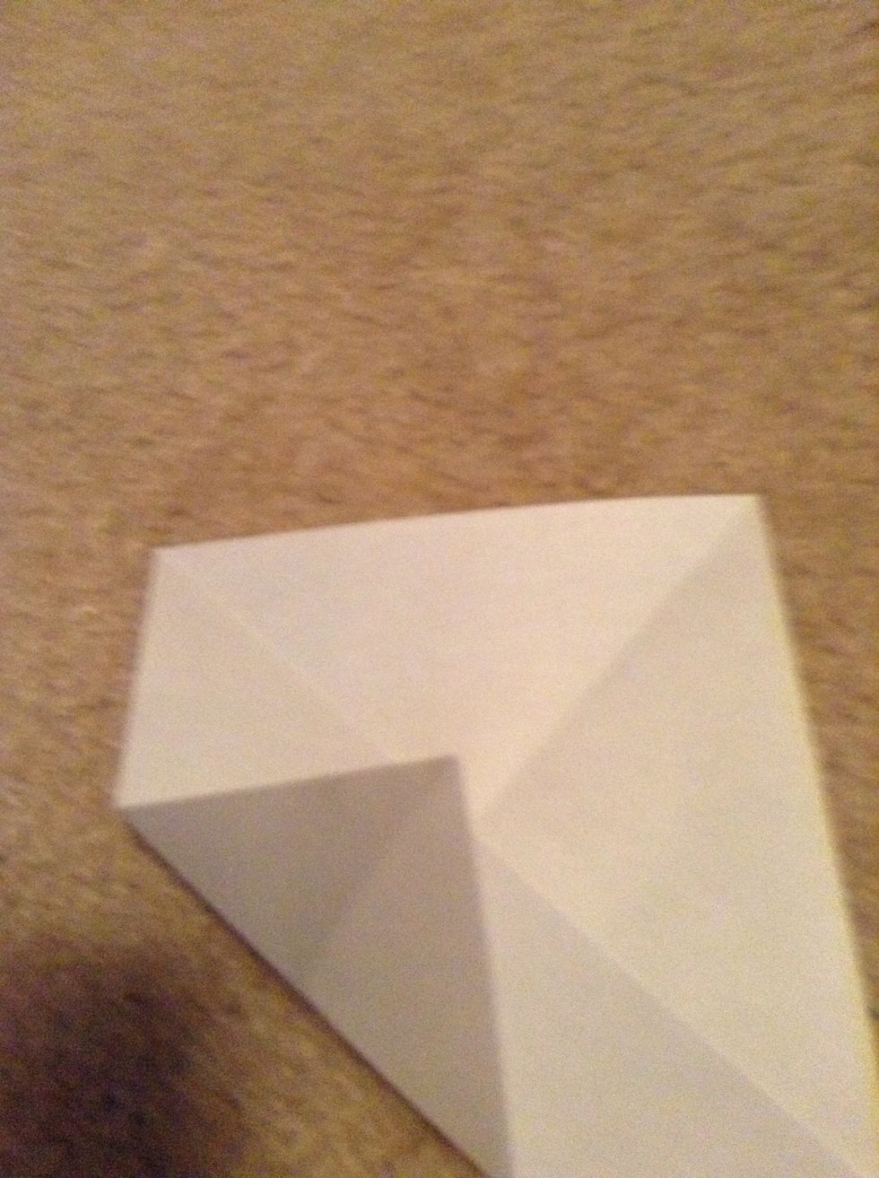 Fold one corner to the middle