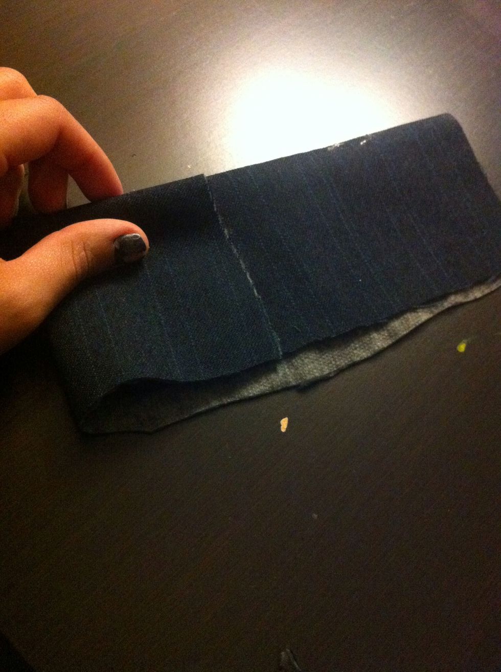 Fold one end towards the middle like this