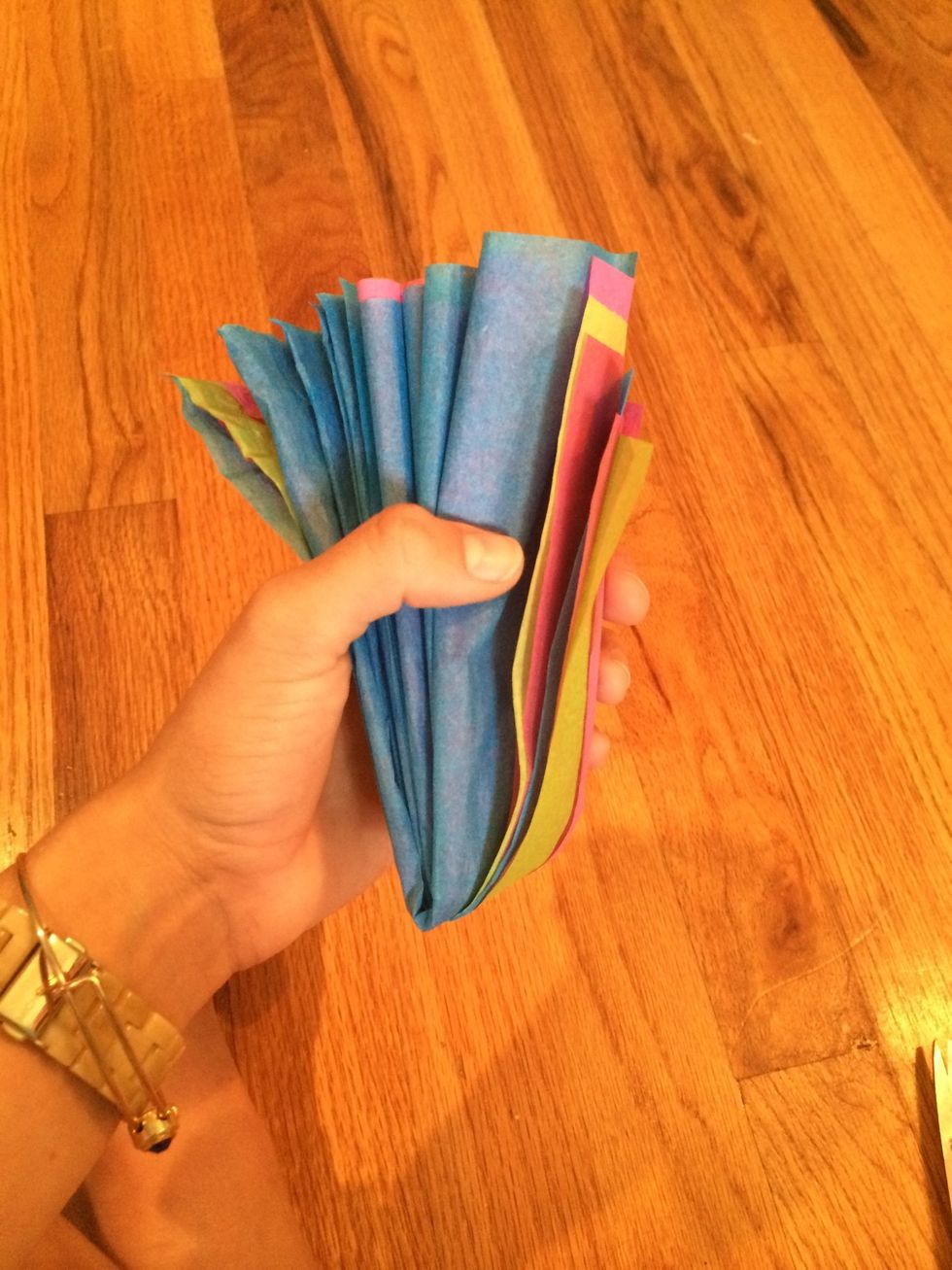 Fold one of the halves in half