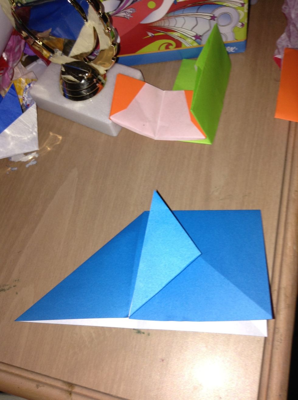 Fold one of the sides up leaving a little gap