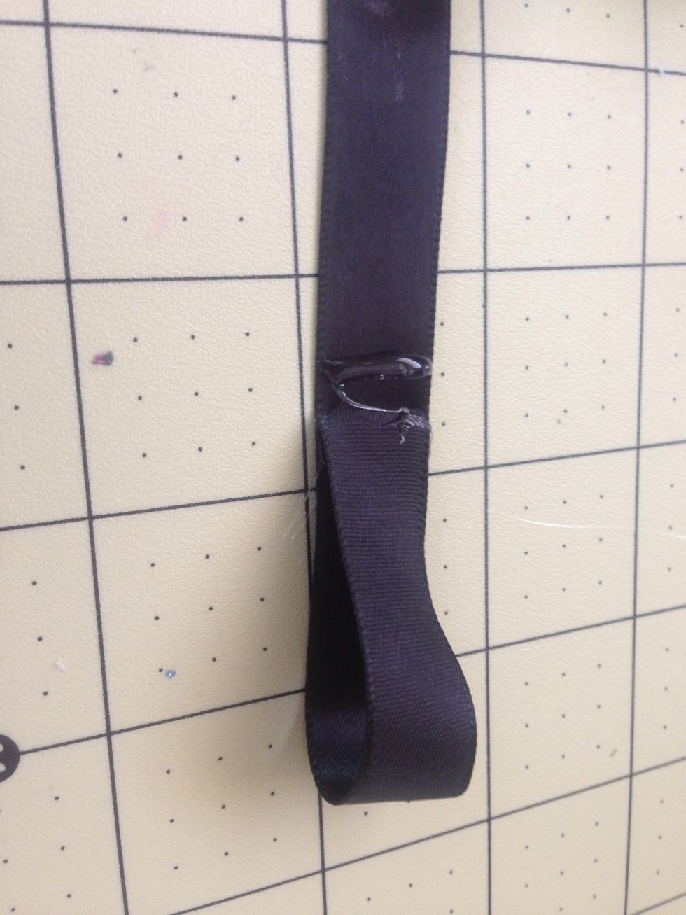 Fold one side down and press on to glue