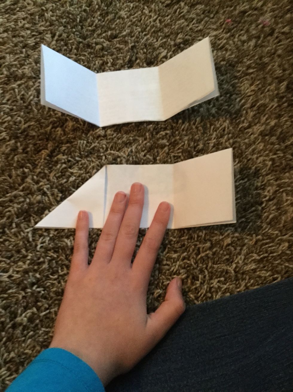 Fold one side down into a triangle