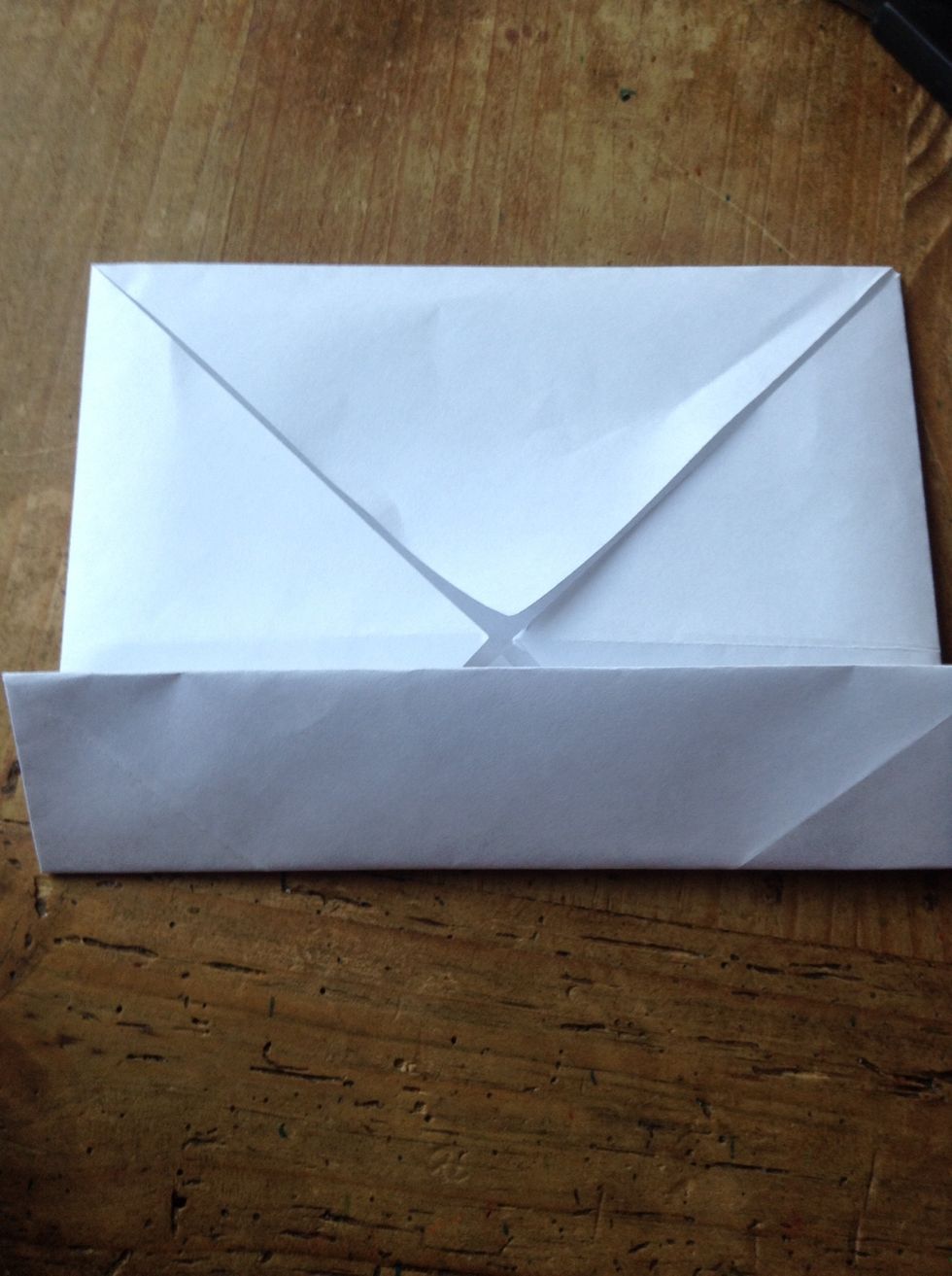 Fold one side into the middle and make a crease