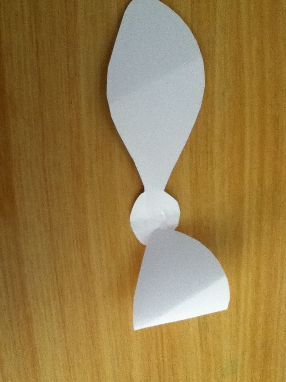 Fold one side inwards, and stick it down.