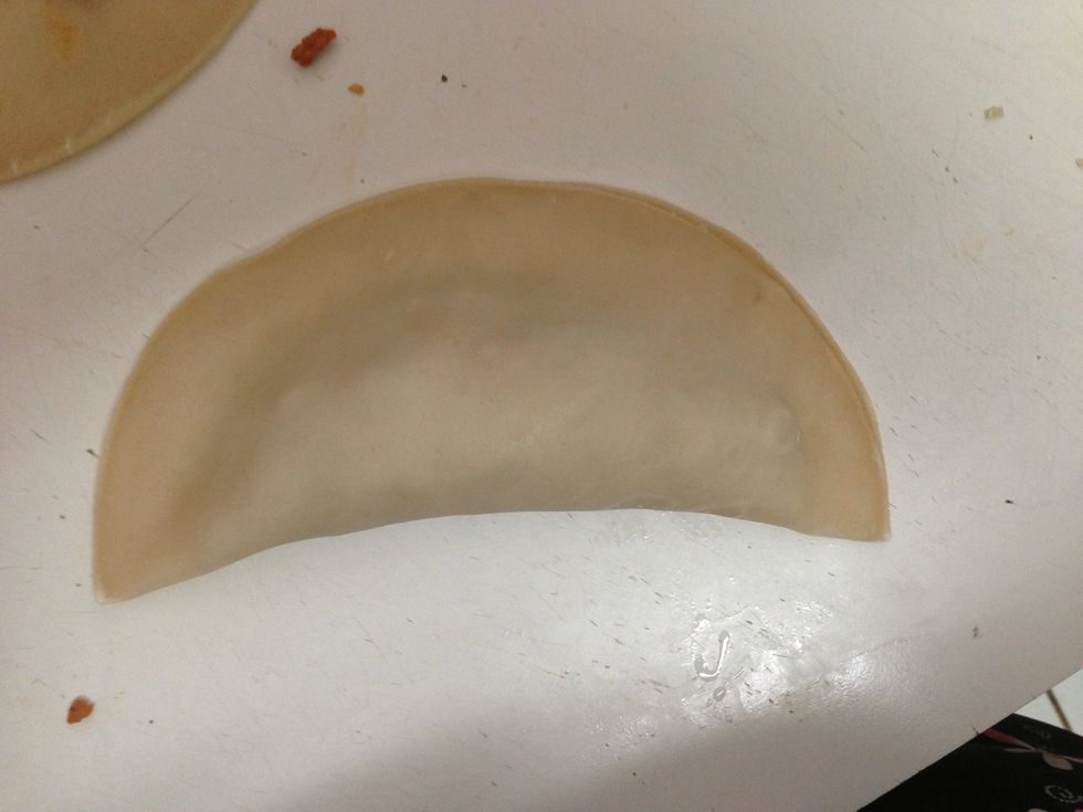 Fold one side of the dough to the other.