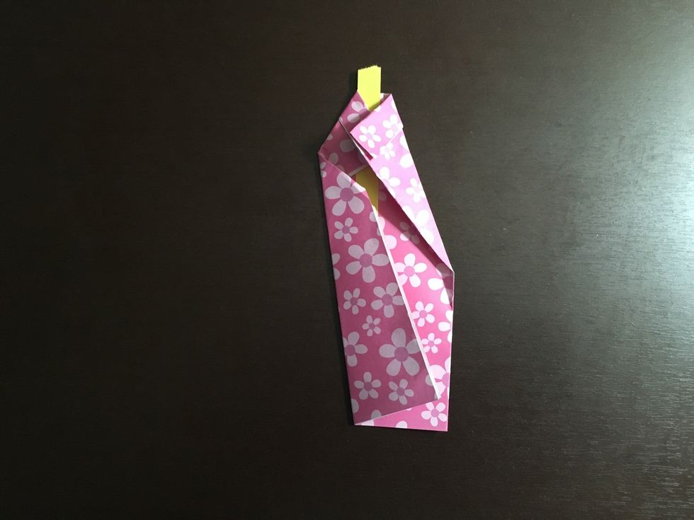 Fold one side of the paper over the star paper