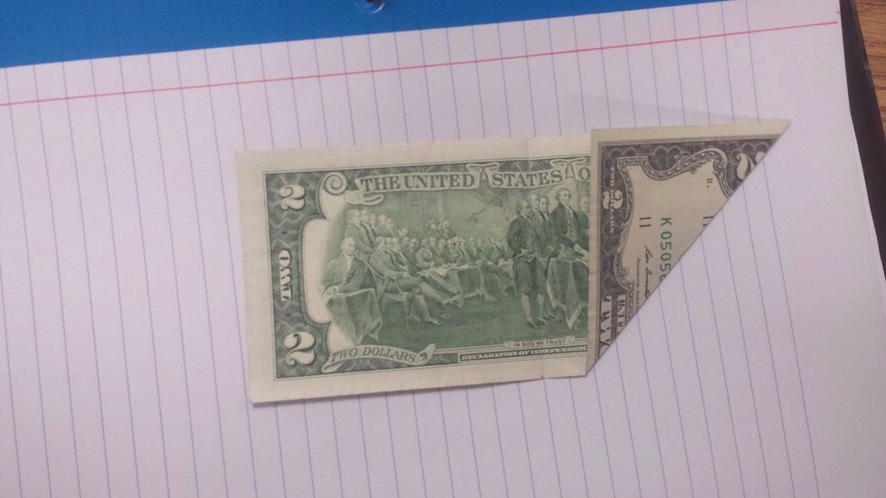 Fold one side to make a perfect point