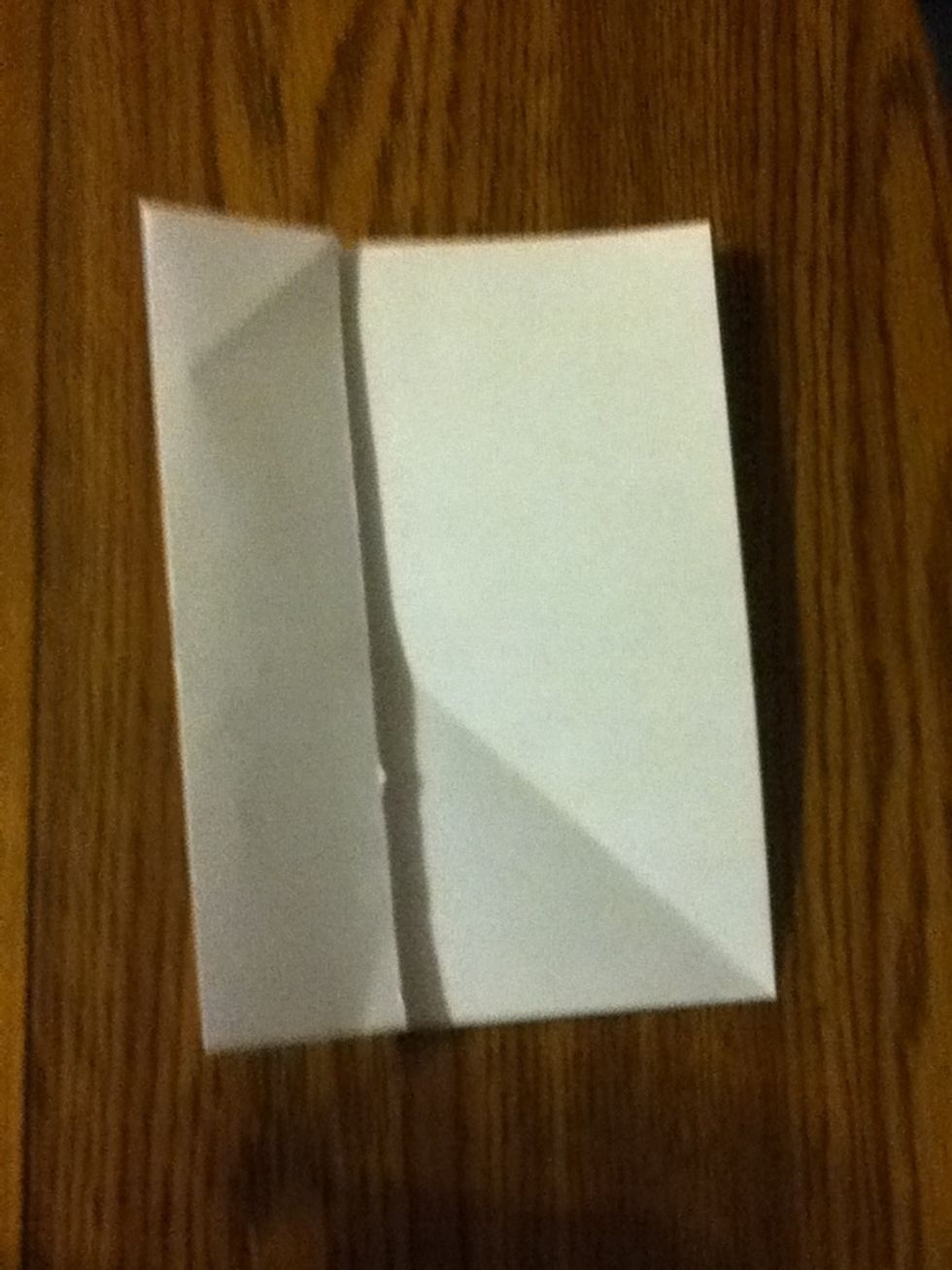 Fold one side to the center fold line.