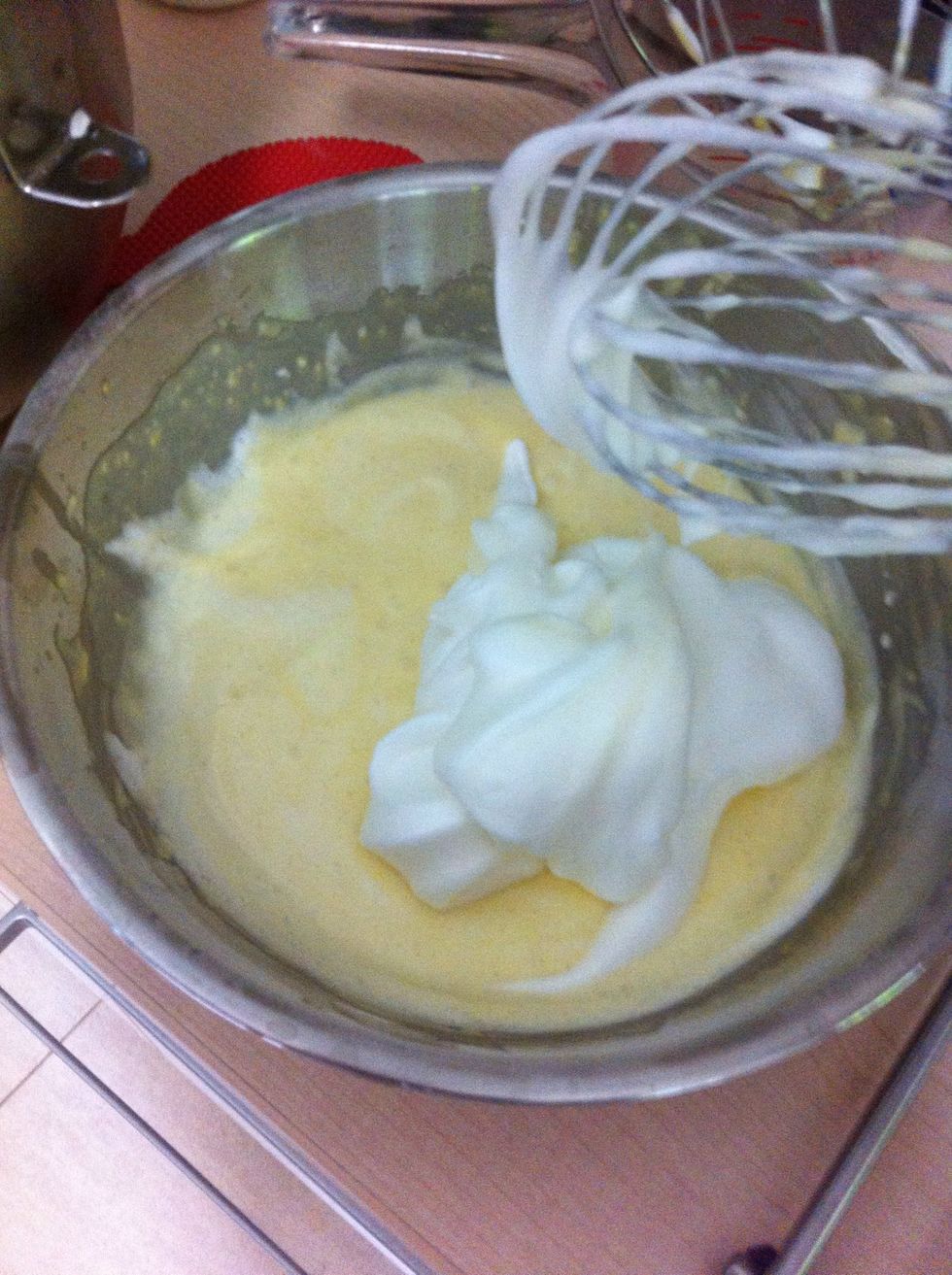 Fold  one-third eggs whites on top of the cheese mixture