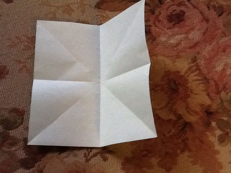 Fold ones again but horizontally and vertically the same way as the other folds.