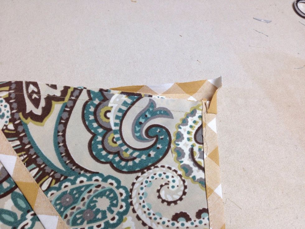 Fold open and press paying careful attention not to touch the adhesive with the iron.