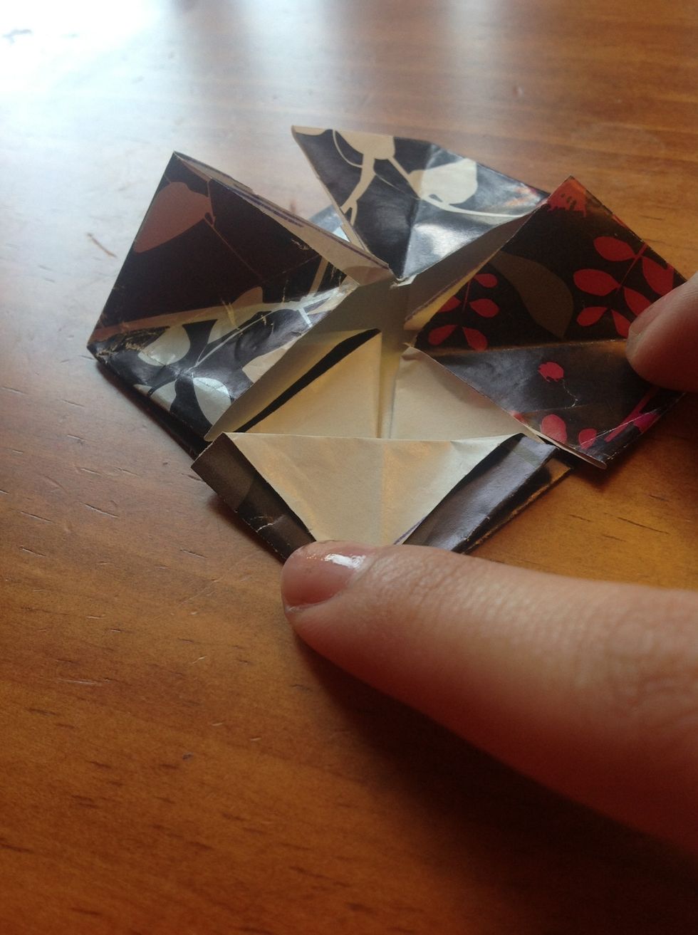 Fold open each flap, but not completely.