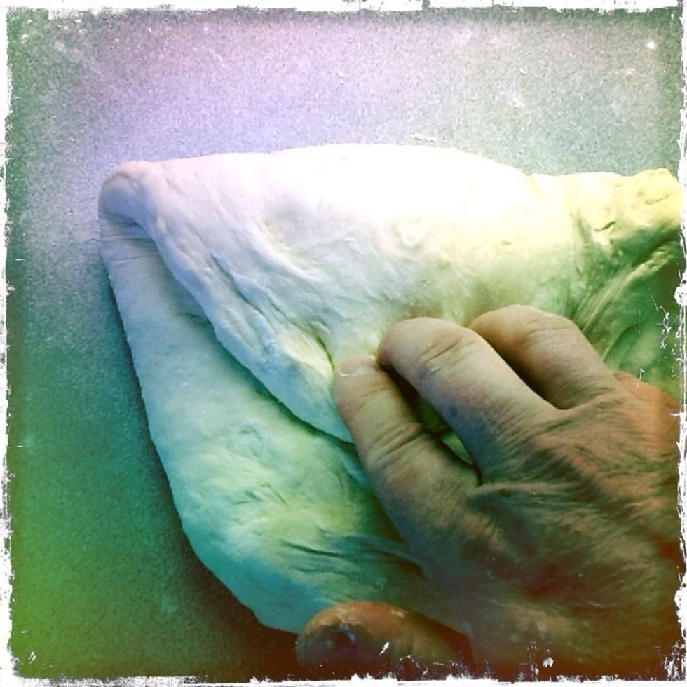Fold over 1/3 of the dough and press.