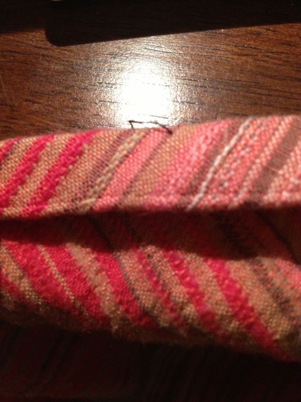 Fold over again, and stitch the edge.