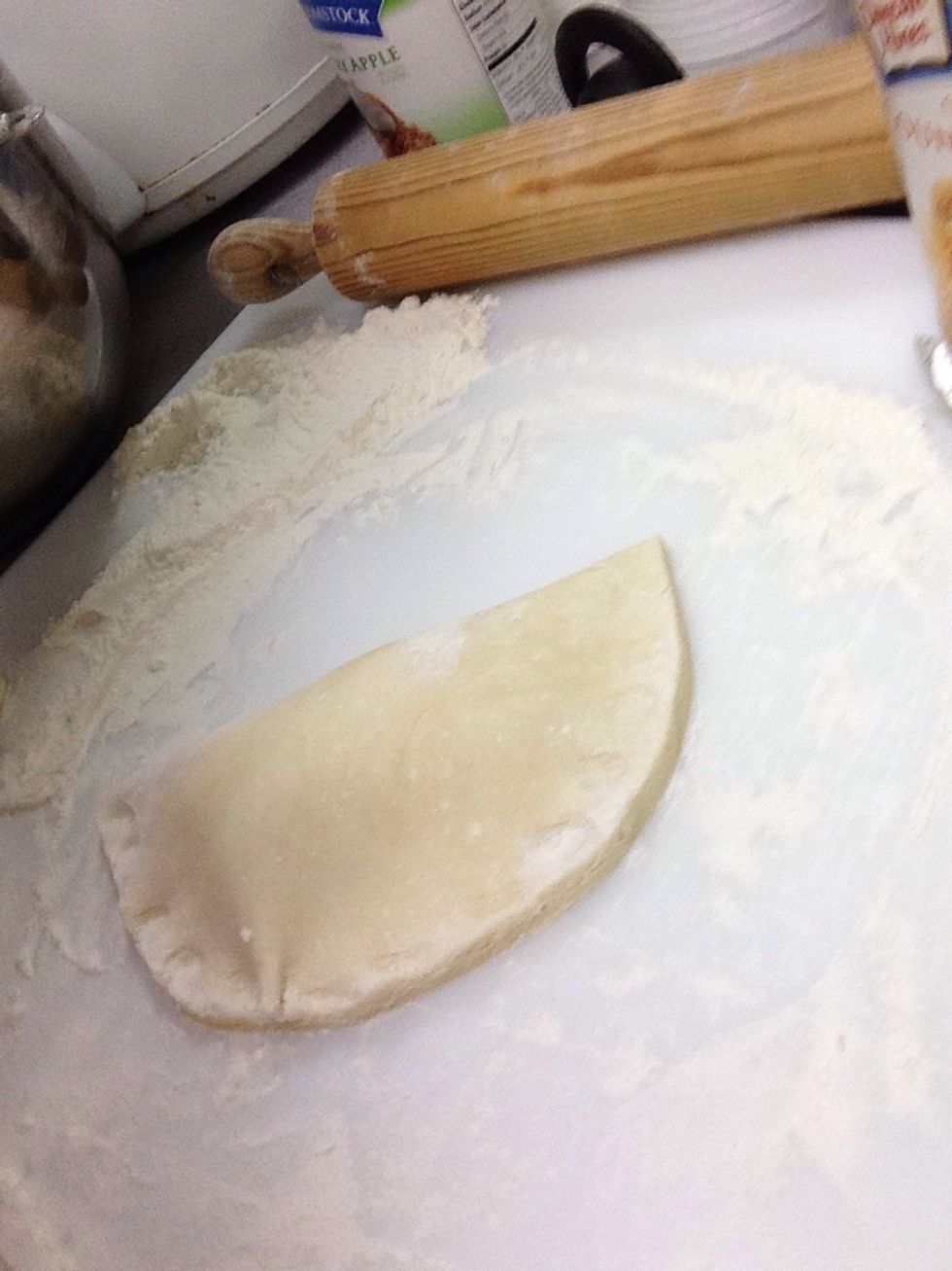 Fold over and cut excess dough away.