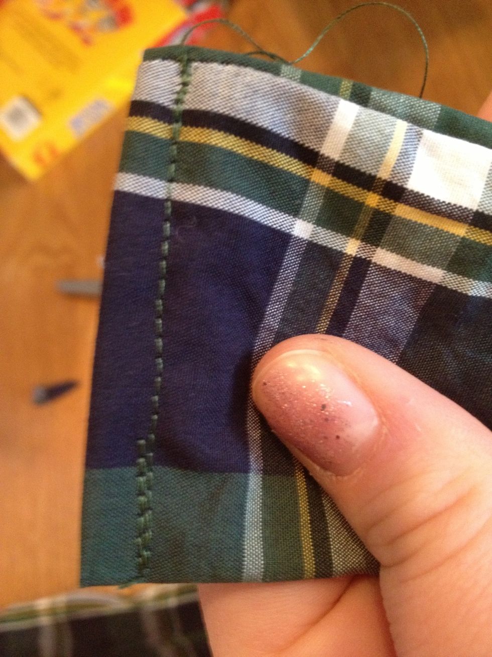 Fold over raw edges to the inside, and stitch. You can iron the sash if you like. Now, put it to the side.